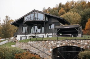 Large and lovely villa in Harstad Sentrum with sauna, hot tub and car rental